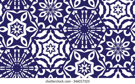 Vector seamless pattern of honeycomb. Blue hexagon decorated with snowflakes. Snowflakes and hexagons patterns. Vintage Textile print