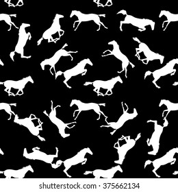 Vector seamless pattern with horses. White horse seamless pattern on blackboard. Running and jumping herd of horses. background with Equine sports theme
