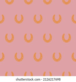 Vector seamless pattern with horseshoes.