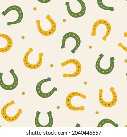 Vector seamless pattern with horseshoes. Vintage repeated texture with the symbols of luck.  Simple print for fabric and wrapping paper.