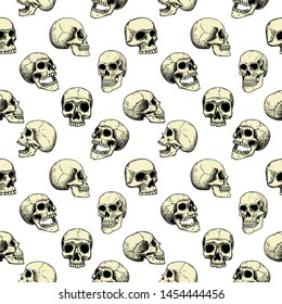 Vector seamless pattern with human skulls on a white background. Line art  in tattoo style.Background for Halloween.