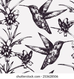 Vector seamless pattern with hummingbird and flowers. Floral background. Hand-drawn picture 