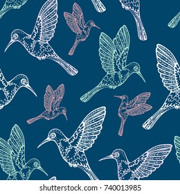 Vector seamless pattern with hummingbird on a blue background. Cartoon wallpaper with birds.