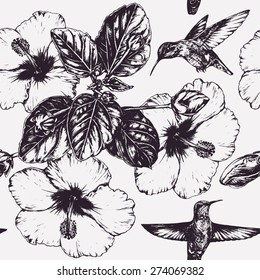 Vector seamless pattern with hummingbirds and hibiscus flowers. Floral background. Hand-drawn picture. Graphic design