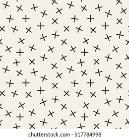 Vector seamless pattern. Inspired by Memphis Design. Randomly spaced crosses, pluses or X. Abstract geometric background. Hipster symbol of kiss.