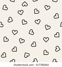Vector seamless pattern. Inspired by Memphis Design. Randomly spaced outlines of hearts. Abstract geometric background.