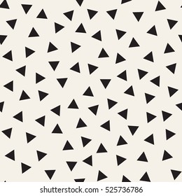 Vector seamless pattern. Inspired by Memphis Design. Randomly spaced triangles. Abstract geometric background. Contemporary hipster print.