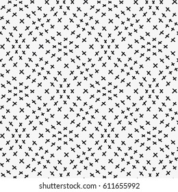 Vector seamless pattern. Inspired by Memphis Design. Trendy texture with random small crosses. Abstract geometric background.