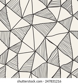 Vector seamless pattern. Irregular abstract linear triangles. Graphic hand drawn background. Doodle monochrome texture. Repeating monochrome sketch with filling hatching