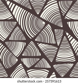 Vector seamless pattern. Irregular abstract linear triangles. Graphic hand drawn background. Zentangle monochrome texture. Repeating monochrome sketch with filling hatching 