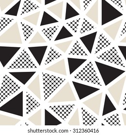 Vector seamless pattern. Irregular abstract grid. Graphical hand drawn background. Reticulated monochrome texture. Filled black and beige triangles, polka dots.