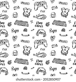 Vector seamless pattern with keyboard, joystick, headphones and lettering for textiles. Black and white background with handwritten phrases, skull, computer mouse and heart.