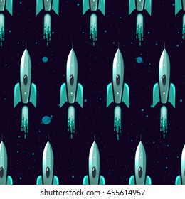 Vector seamless pattern with kid style space blue rockets flying in the outer space.  Endless repeating texture with cute astronautic illustration. Stars and planets flying in the background
