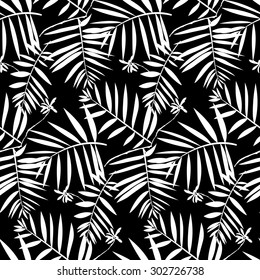 Vector seamless pattern with leafs inspired by tropical nature and plants like frond palm tree and ferns in black and white for fall winter fashion. Graphic floral print, simple texture and background