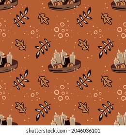 Vector seamless pattern with leaves and candles on an orange background. Thanksgiving theme