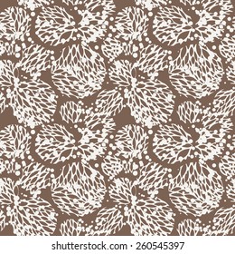 Vector seamless pattern of leaves in contrasting colors