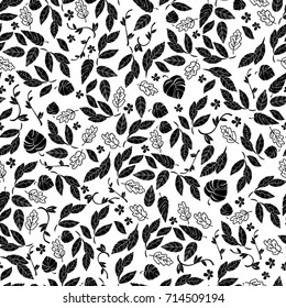 Vector seamless pattern of leaves and flowers. Black and white. Background for textile or book covers, wallpapers, design, graphic art, printing, hobby, invitation