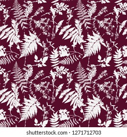 Vector seamless pattern with leaves and plants silhouettes, floral background