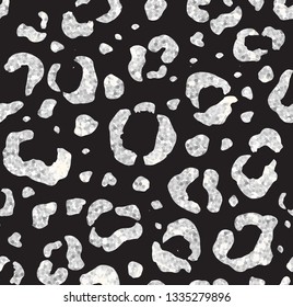 Vector seamless pattern of leopard silver glitter  dots print isolated on black background