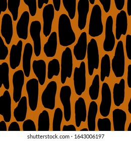 Vector seamless pattern of leopard spots.Abstract black texture in a modern style on an orange background.Ornament for textiles, camouflage, wrapping paper.