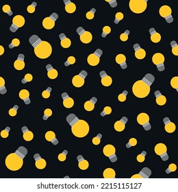 vector seamless pattern with light bulbs. pattern with yellow light bulbs on black background