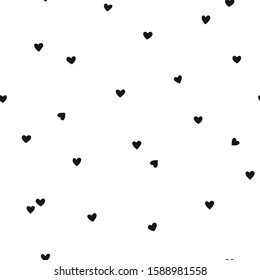 Vector seamless pattern with little hearts. Creative scandinavian childish background for Valentine's Day. Black and white hearty backdrop for wrapping paper, textile, fabric, card making.