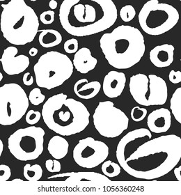 Vector seamless pattern with lowercase calligraphy letters o. Classic white on black. Clipping paths included. The texture is on Swatches Panel and the style on Graphic Styles Panel.