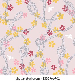 Vector seamless pattern made of twisted ropes with knots, flowers and insects. Abstract graphic drawing. Plane nautical and nature ornament. 