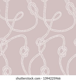 Vector seamless pattern made of twisted ropes with knots. Abstract graphic drawing. Plane nautical ornament. 
