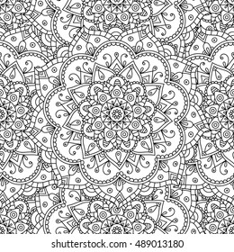 Vector seamless pattern mandala. Patterned doodle background. Vector doodle mandala. Tribal background.