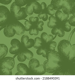 Vector seamless pattern with many large hand drawn clover leaves. Festive composition for St. Patrick's Day. Decorative print with hatching. Vintage art element for holiday advertising  layouts design