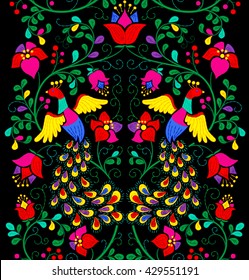 Vector seamless pattern in mexican style. Seamless abstract ethnic ornament. Peacock and flowers embroidery pattern.