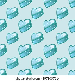 Vector seamless pattern with mint glossy heart-shaped candies.