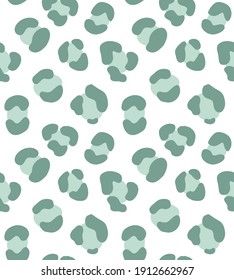 Vector seamless pattern of mint green hand drawn leopard dotted fur print isolated on white background