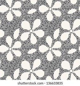 Vector seamless pattern. Modern floral texture. Endless abstract background with dotted flowers