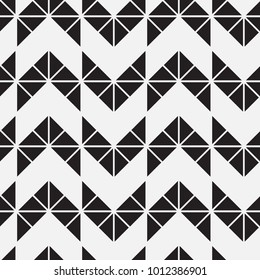 Vector seamless pattern. Modern stylish texture. Repeating geometric tiles with triangles.