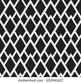 Vector seamless pattern. Modern stylish texture. Repeating geometric tiles with a grid of rhombuses.