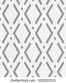 Vector seamless pattern. Modern stylish texture. Repeating geometric tiles with a grid of rhombuses.