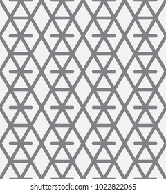 Vector seamless pattern. Modern stylish texture. Repeating geometric tiles with a grid of rhombuses.