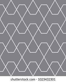 Vector seamless pattern. Modern stylish texture. Repeating geometric tiles with a grid of rhombuses.