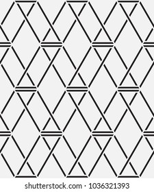  Vector seamless pattern. Modern stylish texture. Repeating geometric tiles with a grid of rhombuses.
