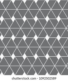  Vector seamless pattern. Modern stylish texture. Repeating geometric tiles with a grid of rhombuses.