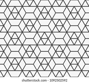 Vector seamless pattern. Modern stylish texture. Repeating geometric tiles with a grid of rhombuses.