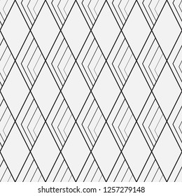  Vector seamless pattern. Modern stylish texture. Repeating geometric tiles with a grid of rhombuses.