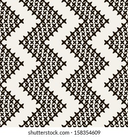 Vector seamless pattern. Modern stylish texture. Repeating geometric tiles with dotted zigzag