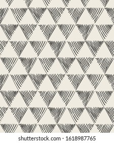 Vector seamless pattern. Modern stylish texture with monochrome hand drawn striped triangles. Repeating geometric  background. Simple graphic design. Trendy hipster geometry.