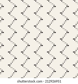 Vector seamless pattern. Modern stylish texture. Repeating geometric tiles with dotted zigzag