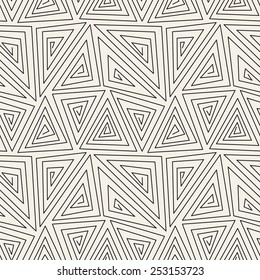 Vector seamless pattern. Modern stylish linear texture with broken spiral. Triangular graphical scroll. Linear hand drawn graphic design