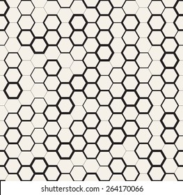 Vector seamless pattern. Modern stylish texture. Repeating geometric tiles with dotted triangles. Regular monochrome background. Different sized hexagons form stylish minimalistic ornament.