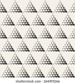 Vector seamless pattern. Modern stylish texture. Repeating geometric tiles with dotted triangles. Regular hipster background. Small triangles form triangular minimalistic ornament.